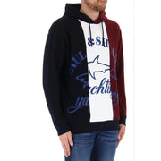 A men’s Paul & Shark color blocked hoodie featuring navy white and maroon panels with a blue shark graphic