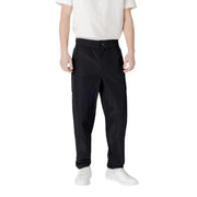 Person wearing Black Athletic Cargo Pants and white shoes demonstrating style and comfort