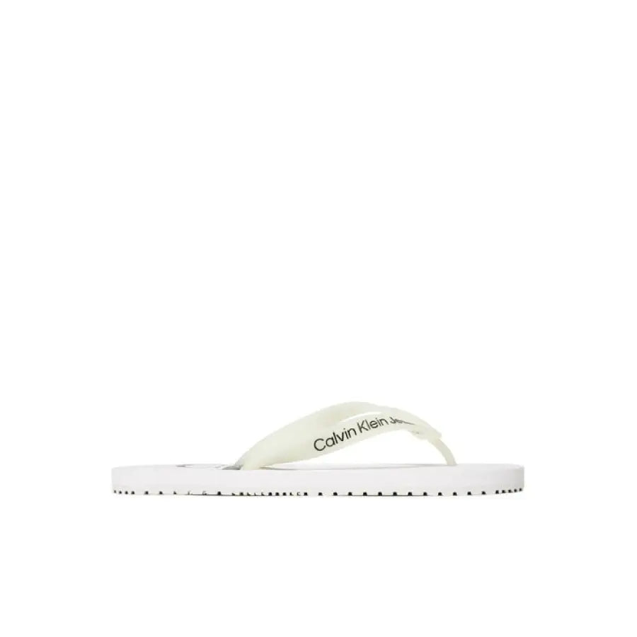 Person wearing Calvin Klein Jeans Men’s Slippers in white