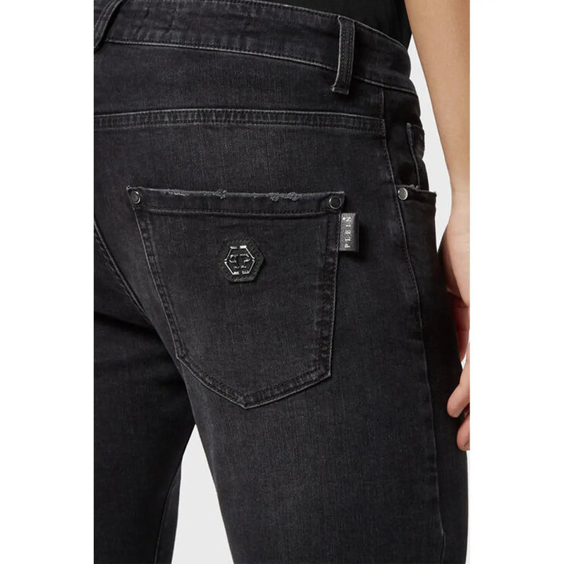 Back side of Philipp Plein black stretch cotton jeans for women featuring a hexagonal logo patch on the pocket