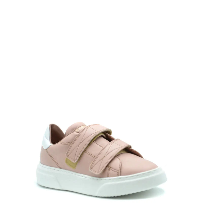 A blush pink leather sneaker for women by Philippe Model with two velcro straps and a white rubber sole