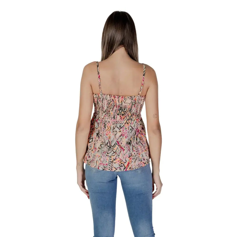 Pink sleeveless B.young women’s cotton tank top with a pink and black abstract patterned smocked design and thin straps
