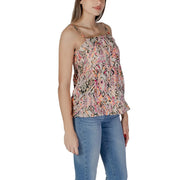 Pink sleeveless B.young women’s cotton tank top with vibrant pink orange and black geometric pattern on beige fabric