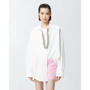 Pinko white cotton oversized blouse with silver beaded neckline and rhinestone buttons