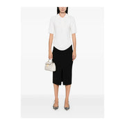 A sleek off-white leather handbag with structured design and gold-tone hardware alongside Pinko women black viscose blend skirt