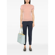 Light blue leather tote bag with contrasting yellow interior and silver-toned metal clasp for pinko women slim trousers