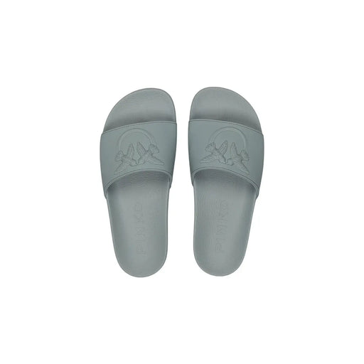 Pinko Pantoufles ouvertes pour femmes en PVC vert, avec un design minimaliste gris clair et une semelle intérieure ornée d'un motif d'oiseau en relief.