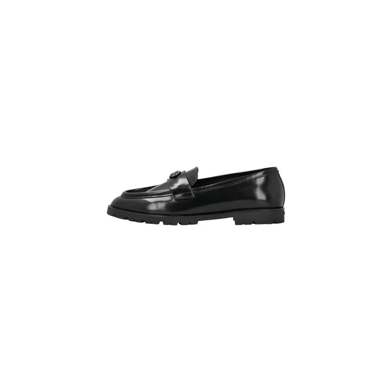 Pinko women leather slip on shoes in black featuring patent leather, metallic buckle, and chunky rubber sole