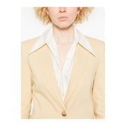 Cream-colored pinko yellow linen blazer with crisp white collar subtle sheen and single button closure