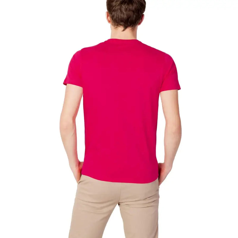 A vibrant fuchsia short-sleeved crew neck t-shirt by US Polo Assn for men in comfortable cotton fabric