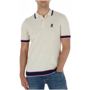 Cream-colored ribbed Psycho Bunny men polo shirt with navy and pink trim and black embroidered rabbit logo in cotton
