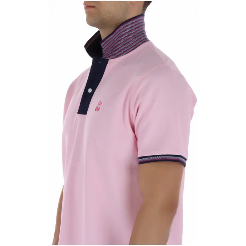 Psycho Bunny men polo shirt pink short sleeve cotton with navy blue accents and subtle striped collar and sleeve cuffs