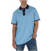 Psycho Bunny men polo shirt light blue short sleeve cotton with navy collar sleeve trim and pink embroidered logo
