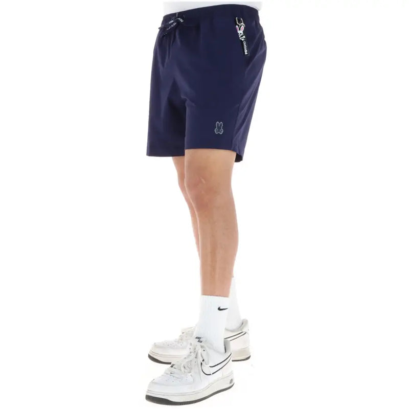 Navy blue Psycho Bunny men swimwear shorts with drawstring waistband and subtle embroidered logos on side and thigh
