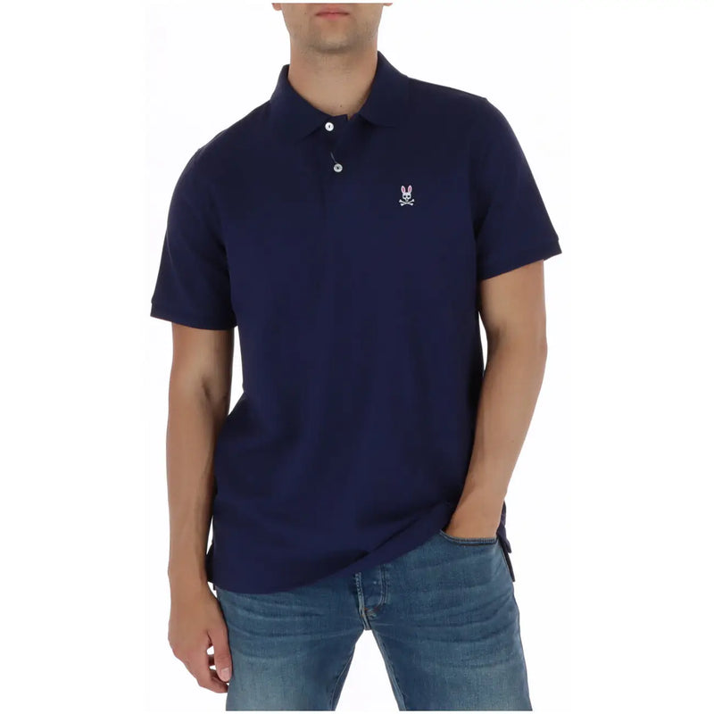 Psycho Bunny polo for men in navy blue with white embroidered rabbit and skull logo, front view