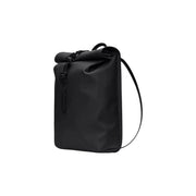 Rains men backpack mini black roll-top with matte fabric, zip pockets, and adjustable shoulder strap, front view