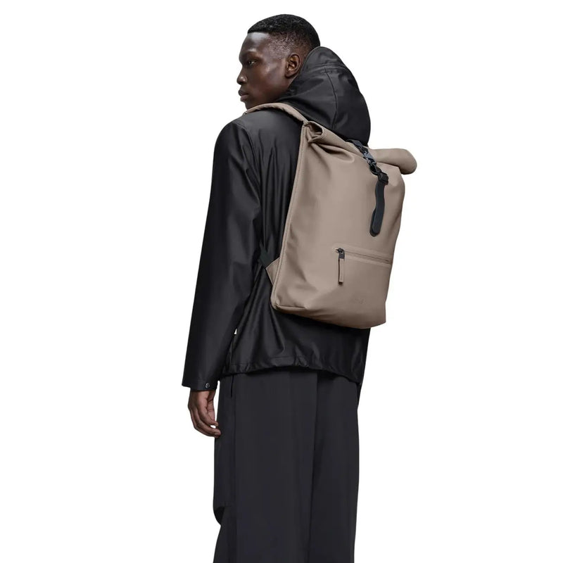 Beige rains unisex rolltop rucksack with black accents and minimalist design made of grey polyester W12 x H48 x L12 cm