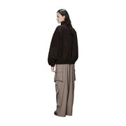 Black oversized bomber jacket with elastic cuffs and high collar shown from the back in rains women fleece zip jacket brown polyester