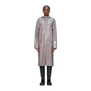 A sleek metallic gray polyester raincoat with glossy finish and front button closure from Rains Women Lilac collection
