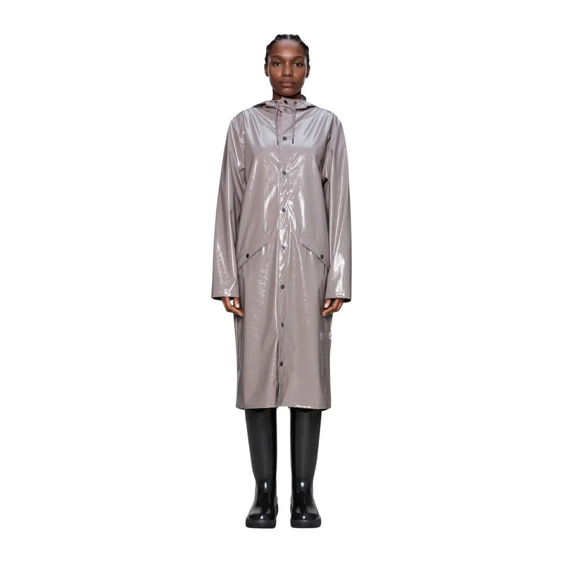 A sleek metallic gray polyester raincoat with glossy finish and front button closure from Rains Women Lilac collection