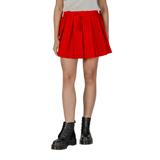 Red lace polyester skirt for women featuring a vibrant red pleated mini design with matching waist belt