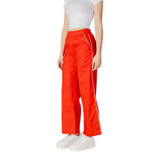 Red Wide Leg Pants featuring white stripe detailing for a stylish athleisure look