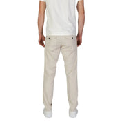 Beige cotton chino trousers by refrigiwear with a tailored fit and subtle stitching for fall winter wear