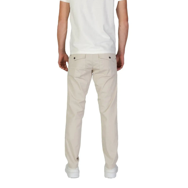 Beige cotton chino trousers by refrigiwear with a tailored fit and subtle stitching for fall winter wear