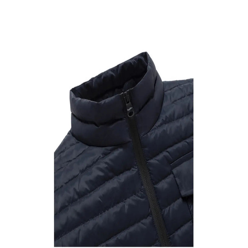 Refrigiwear men jacket blue full zip turtleneck featuring a dark navy quilted puffer vest with high collar and black zipper