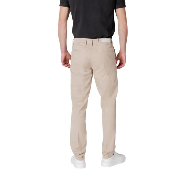 Replay men beige chino trousers with tailored fit subtle stitching and zip and button closure in front view