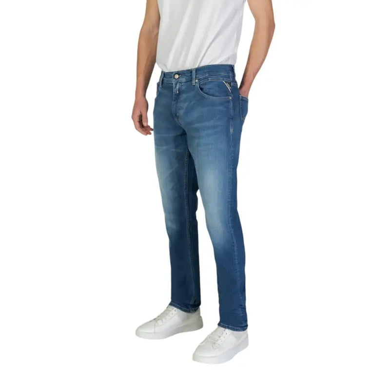 Replay men jeans in blue denim with slim fit faded wash and zip and button details shown from the back side