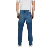Replay men jeans in blue denim with classic straight-leg cut, subtle fading, and reel flex label on back waistband