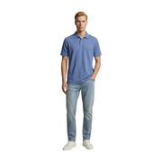 A man wearing a light blue short-sleeved polo shirt paired with Replay men jeans light blue regular slim cotton stretch