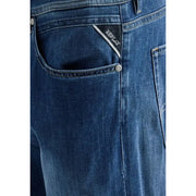 Back side of replay men straight leg jeans in dark blue stretch cotton denim with subtle faded wash and branded back pocket patch