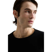 Replay mens black cotton long sleeve t shirt with crew neck showcasing a classic casual design in black color