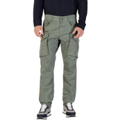 Men’s olive green cargo pants with black long-sleeve shirt and grey black sneakers