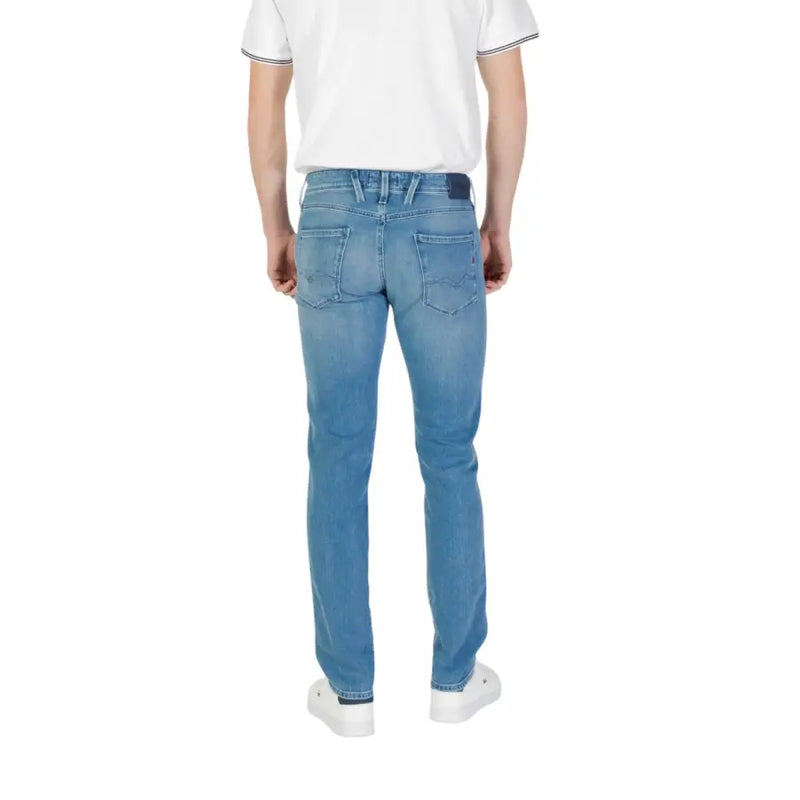 Replay mens light blue denim jeans in stretch cotton slim fit with subtle fading and classic back pockets visible