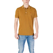 Replay men’s yellow short sleeve polo shirt in mustard with classic collar and red embroidered logo on left chest