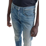 Jean slim Replay Anbass pour homme en denim clair délavé à l'aspect usé et subtilement délavé le long des jambes (vue de face)