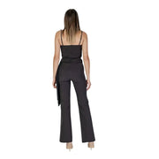 Black sleeveless Rinascimento jumpsuit with thin straps and flared legs featuring a square neckline design