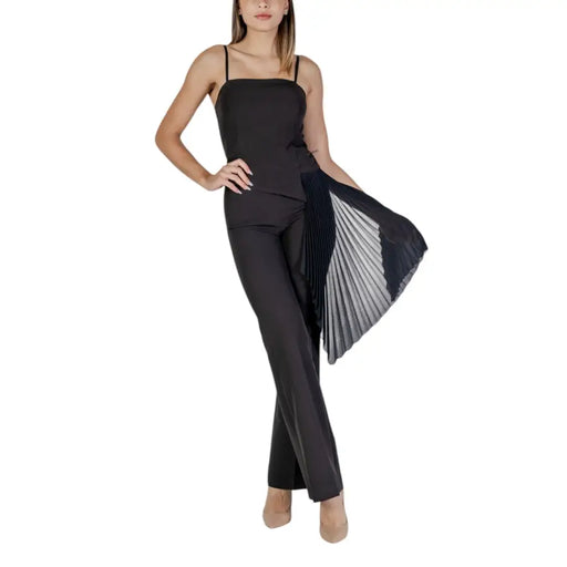 Rinascimento black sleeveless dress with square neckline featuring sheer pleated overlay and flared pants detail