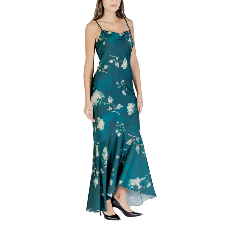 Rinascimento green floral strap dress in teal satin with cream and white floral pattern, thin straps, and high-low hemline