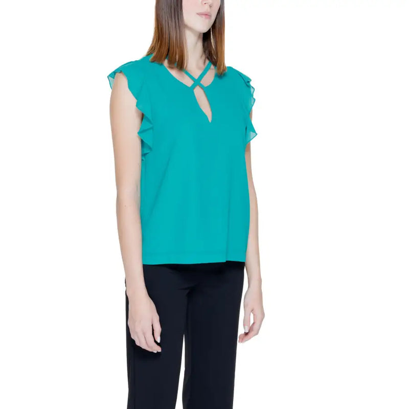 Rinascimento green sleeveless blouse for women in teal chiffon with ruffled cap sleeves and a crisscross neckline
