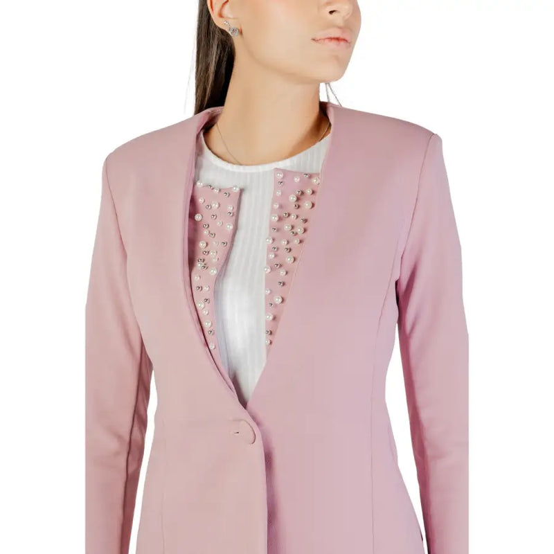 A soft pink Rinascimento long blazer with tailored fit and rhinestone button details along the front opening