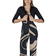 Rinascimento women black long slip on cardigan paired with black and beige abstract-patterned high-waisted trousers