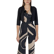 Black and beige abstract-patterned wide-leg trousers with a sleek modern design for women by Rinascimento