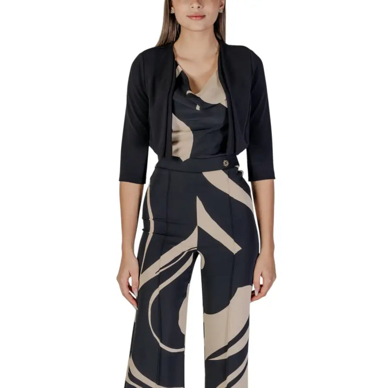 Black and beige abstract-patterned wide-leg trousers with a sleek modern design for women by Rinascimento