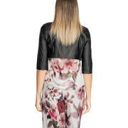 Rinascimento women black polyurethane cropped bolero jacket with three quarter sleeves worn over floral dress
