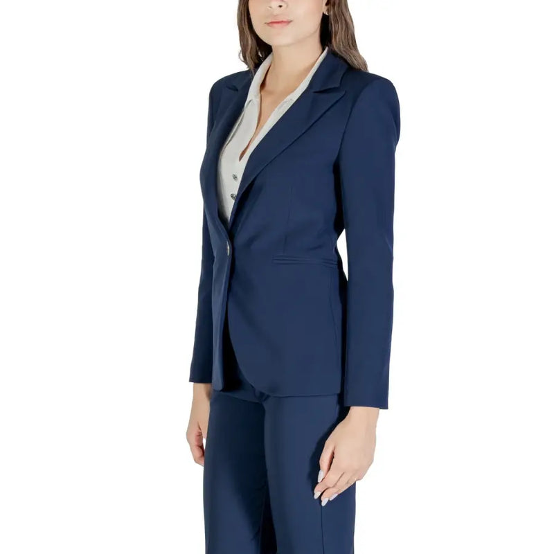 Women’s navy blue pantsuit with light-colored blouse from Rinascimento for fall winter wear