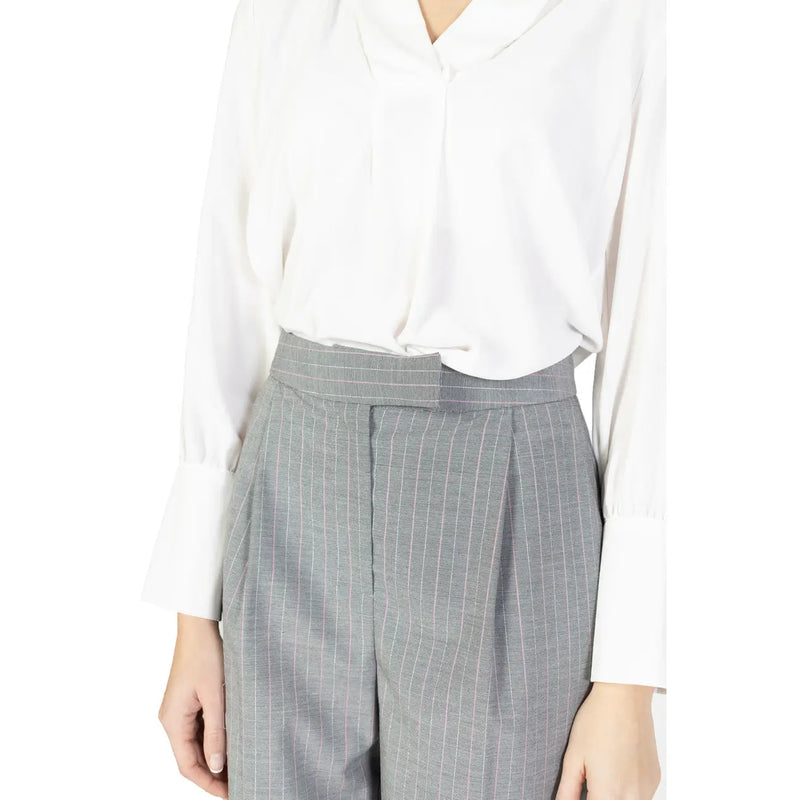 Rinascimento women’s pink pinstripe trousers featuring high-waisted gray pinstripe pleated front and structured belt loop